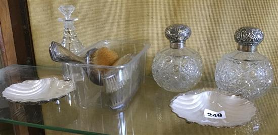 Pair of silver butter dishes, glass scent bottles, brushes etc